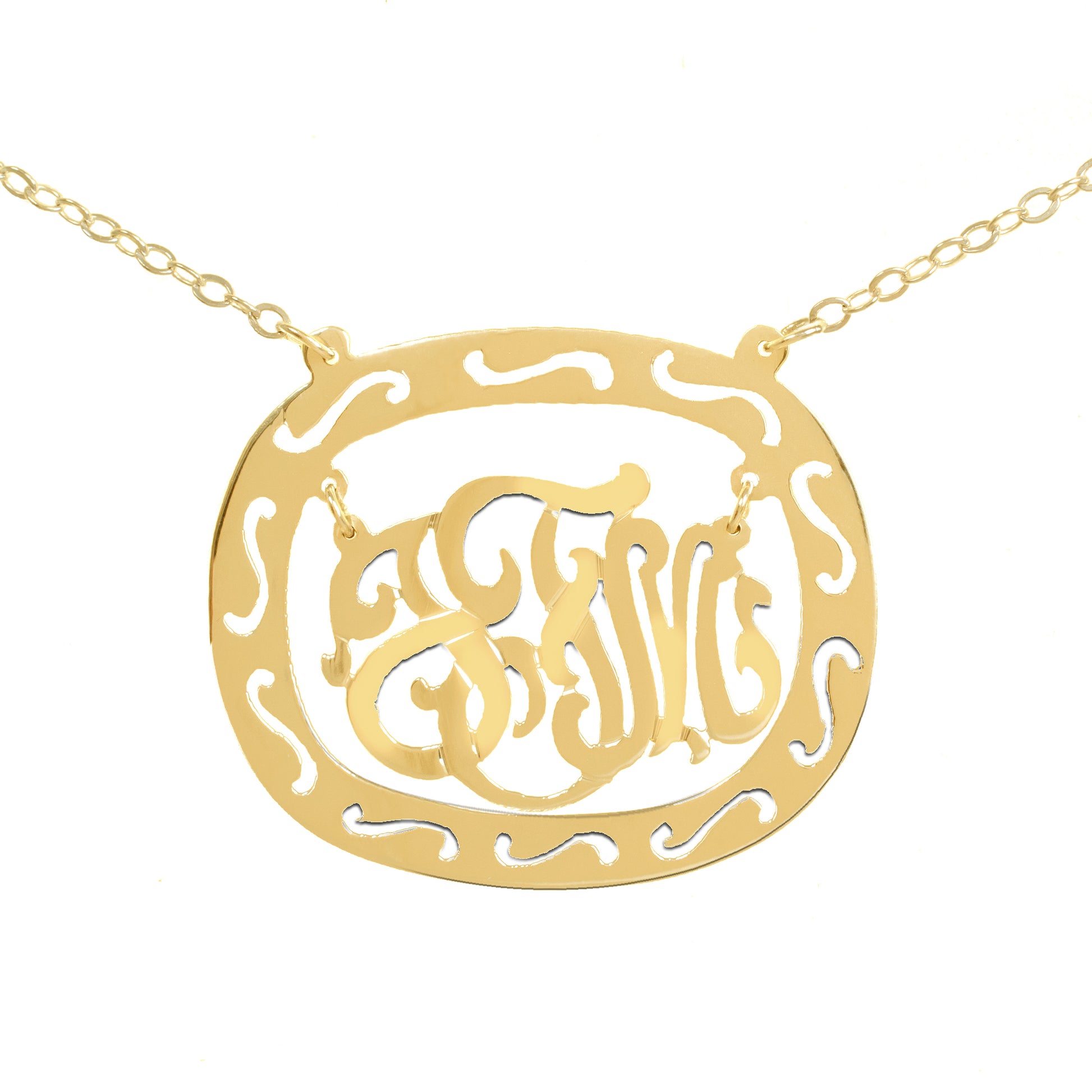 gold-plated silver oval monogram necklace inside thick patterned circular frame